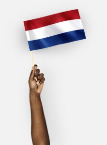 person holding netherlands flag